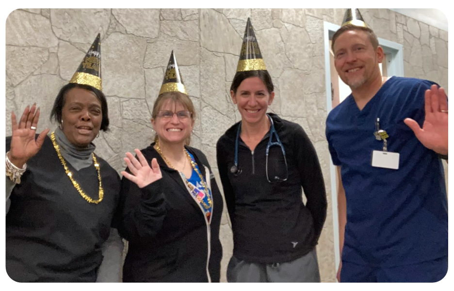 Pm Pediatric Care staff celebrating a birthday at the office