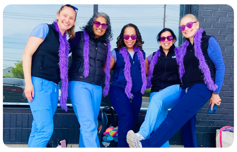 Pm Pediatric Care staff dressed in matching outfits for a theme day