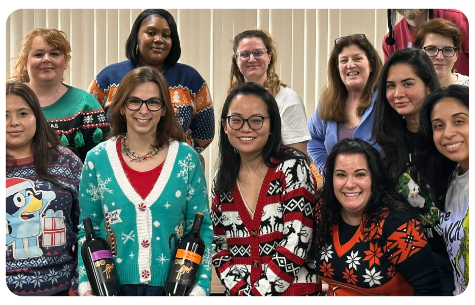 PM Pediatric Care staff dressed up in holiday sweaters